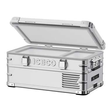 Image of a silver ICECO portable refrigerator/freezer with chrome accents and the lid partially open, revealing a white interior with two compartments, shown from an angled front and side view on a white background