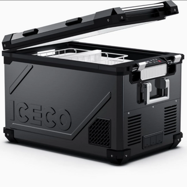 An image of a black ICECO portable refrigerator/freezer with its lid partially open, revealing a white interior basket. The cooler has a rugged design with textured side panels, black corner protectors, and a control panel with a digital display. It is shown from an angled front and side view on a white background