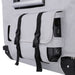 A close-up view of the side pocket on the ICECO APL55 portable refrigerator/freezer's light gray protective cover, featuring black adjustable straps and revealing various power ports, on a white background