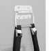 A close-up image showing two black securing straps with metal buckles attached to the silver handle of a gray portable refrigerator, highlighting the mechanism for securing the cooler to a slide