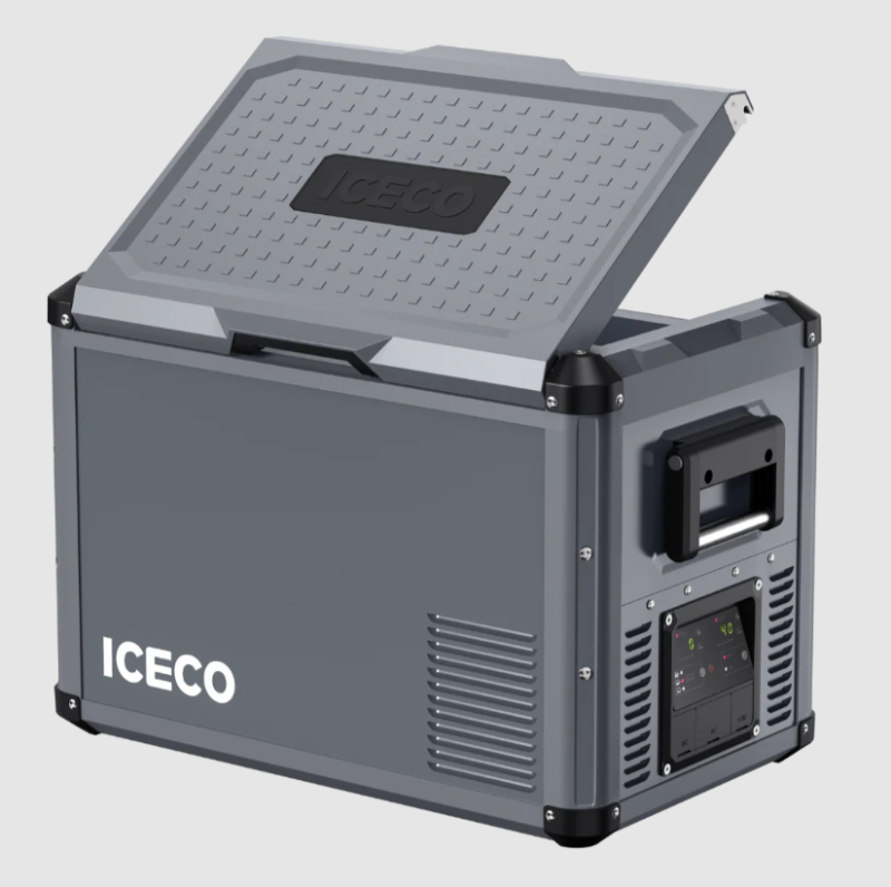 Image of an ICECO portable refrigerator/freezer in dark grey, with its textured lid partially raised, revealing the interior. The "ICECO" logo is visible on the top of the lid and on the lower front of the unit. The side panel features a control interface with a screen, buttons, and ventilation grilles, along with a black handle
