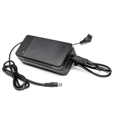 Image of JackRabbit ultra fast battery charger with black power brick and attached cables, angled front and side view on white background.