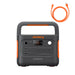 Image of Jackery Explorer 1000 portable power station with integrated carry handle, front control panel and multiple power ports visible, dark gray body with orange accents and included charging cable shown above, straight-on front view on white background.