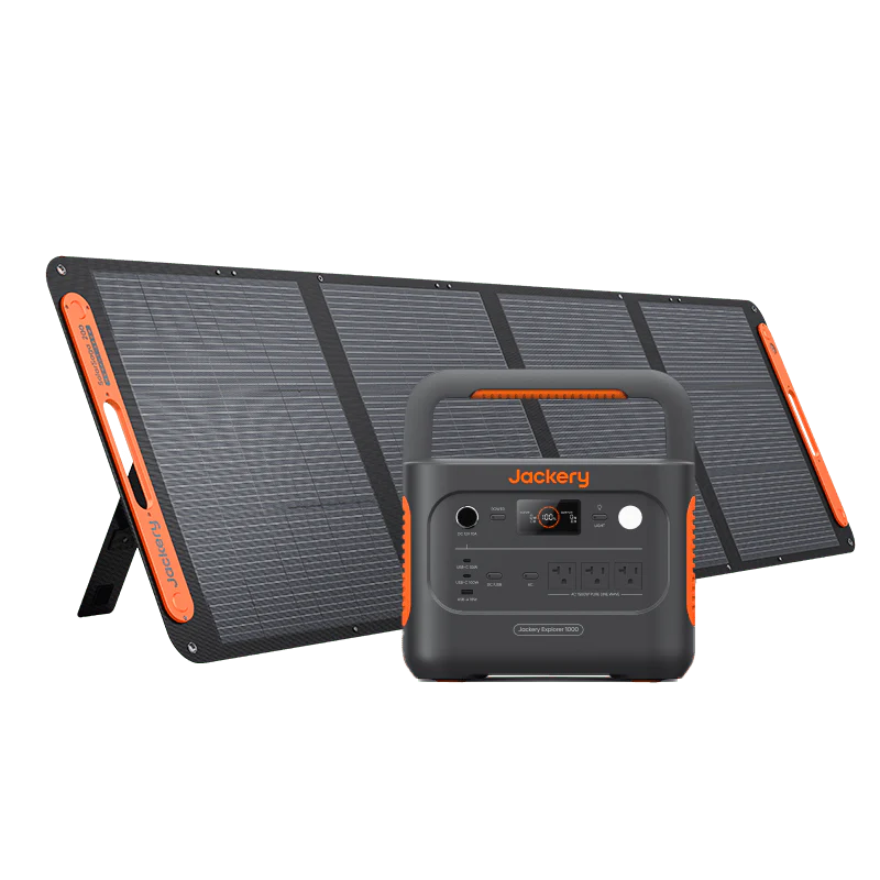 Image of Jackery Explorer 1000 portable power station paired with a foldable solar panel, black and orange design with carry handle, front-facing unit positioned in front of angled solar panels on a white background.
