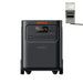Image of Jackery HomePower 3600 Plus portable power station shown connected to a manual transfer switch, black design with front-facing control panel, straight-on view on a white background.