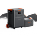 Image of Jackery HomePower 3600 Plus portable power station with wheels paired with an expansion battery and foldable solar panels, black and orange design, angled front and side view on a white background.