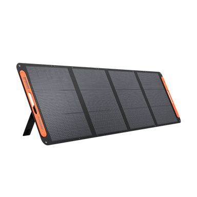 Image of a Jackery portable foldable solar panel with black photovoltaic cells and orange accents, partially deployed on built-in kickstands, angled front and side view on white background.