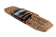 Image of a new MAXTRAX brand tan off-road recovery traction board with packaging, shown at a slight angle on a grey background.
