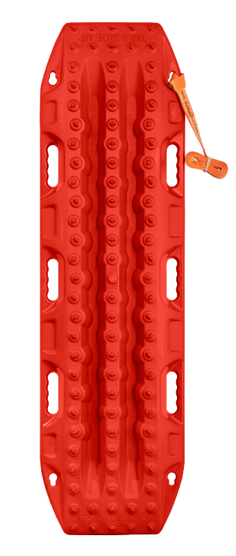 Image of red MAXTRAX MKII recovery traction board with raised cleats, integrated carry handles, and orange leash strap, top-down view on white background.