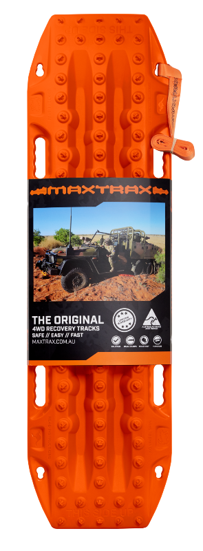 Top-down image of an orange Maxtrax recovery board, with its product packaging featuring an off-road vehicle and brand details, and an orange leash visible, on a light gray background.