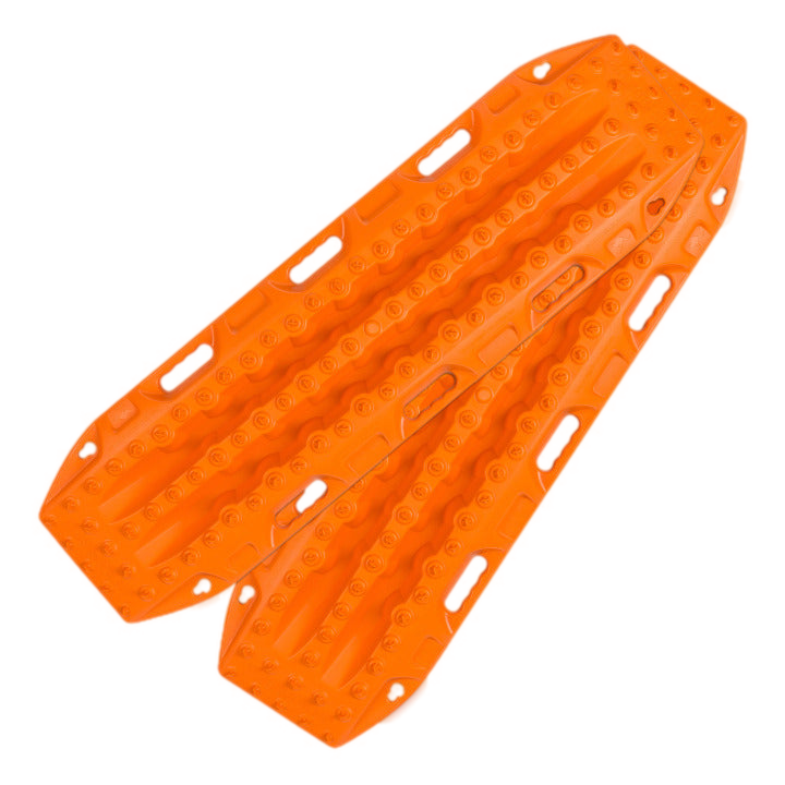 Image of two bright orange recovery traction boards, side-by-side with textured surfaces and handholds, on a light gray background.