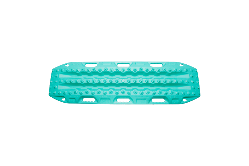 Image of teal MAXTRAX MKII recovery traction board with raised cleats and integrated carry handles, horizontal top-down view on black background.