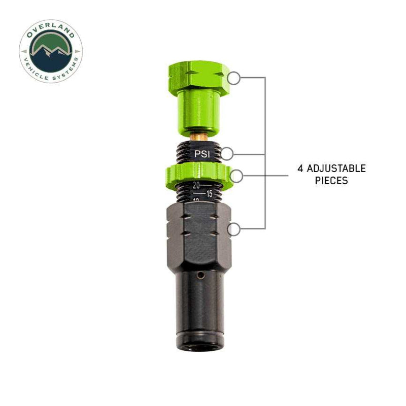 Image of a single Up Down Air tire deflator showing its four adjustable pieces, with a green top and a threaded body displaying PSI markings, on a white background with the "Overland Vehicle Systems" logo.