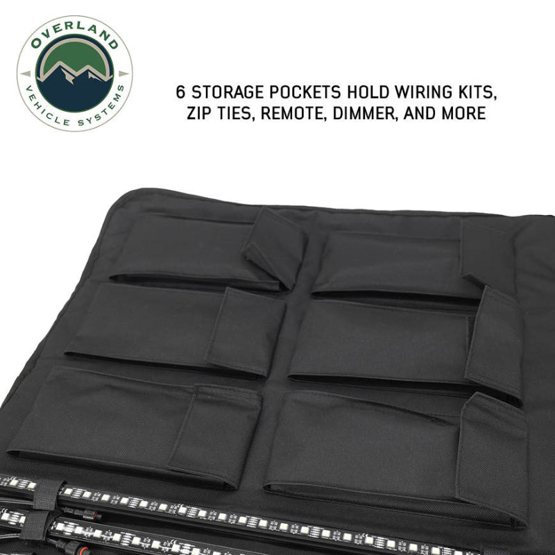 Image of OVS universal LED light kit roll-up organizer showing six storage pockets for wiring, remote, and accessories, top-down close-up view on a white background.