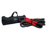 Image of Overland Vehicle Systems kinetic recovery rope with red reinforced loops and black braided synthetic rope, displayed alongside branded black storage bag, angled front view on white background.