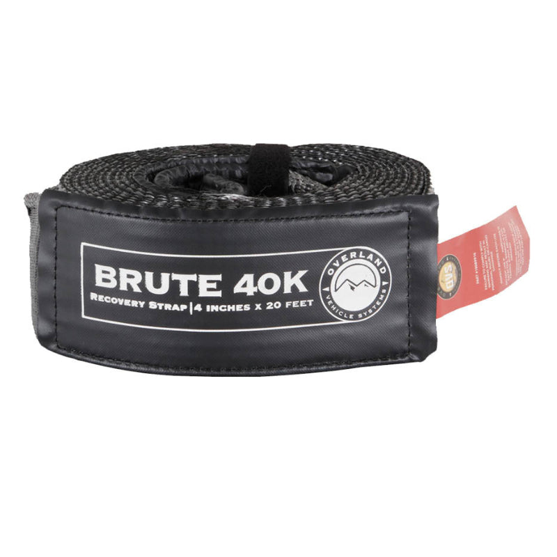 Image of OVS Brute 40K recovery tow strap rolled and secured, black padded protective sleeve with gray synthetic webbing and branded label, straight-on front view on white background.