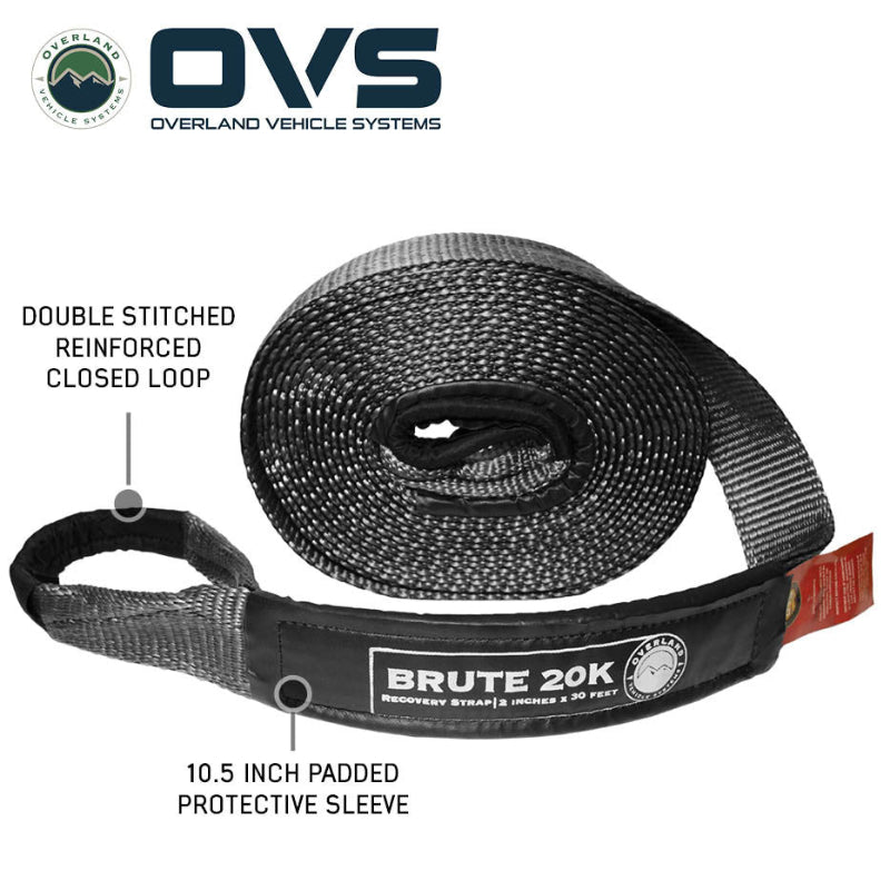 Image of OVS Brute Recovery Tow Strap partially unrolled with double-stitched reinforced loop and padded protective sleeve, gray and black woven strap shown at an angled view on a white background.