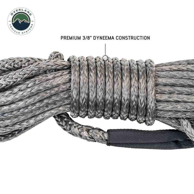 Image of premium 3/8-inch Dyneema winch line extension coiled with protective eyelet sleeve, gray braided rope texture, close-up angled view on white background.
