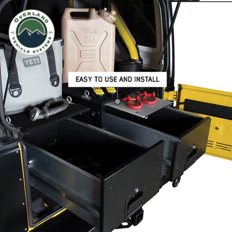 Overland Vehicle Systems (OVS) Cargo Box 210102015 with two open drawers, showing a Yeti cooler and a water jug. The drawers are pulled out, revealing a spacious storage area for off-road gear
