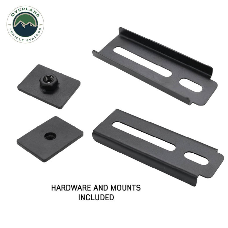 Image of the black mounting hardware and brackets included with the MOLLE panel kit, featuring two bracket mounts with elongated slots and two sliding plates with threaded inserts, all on a white background