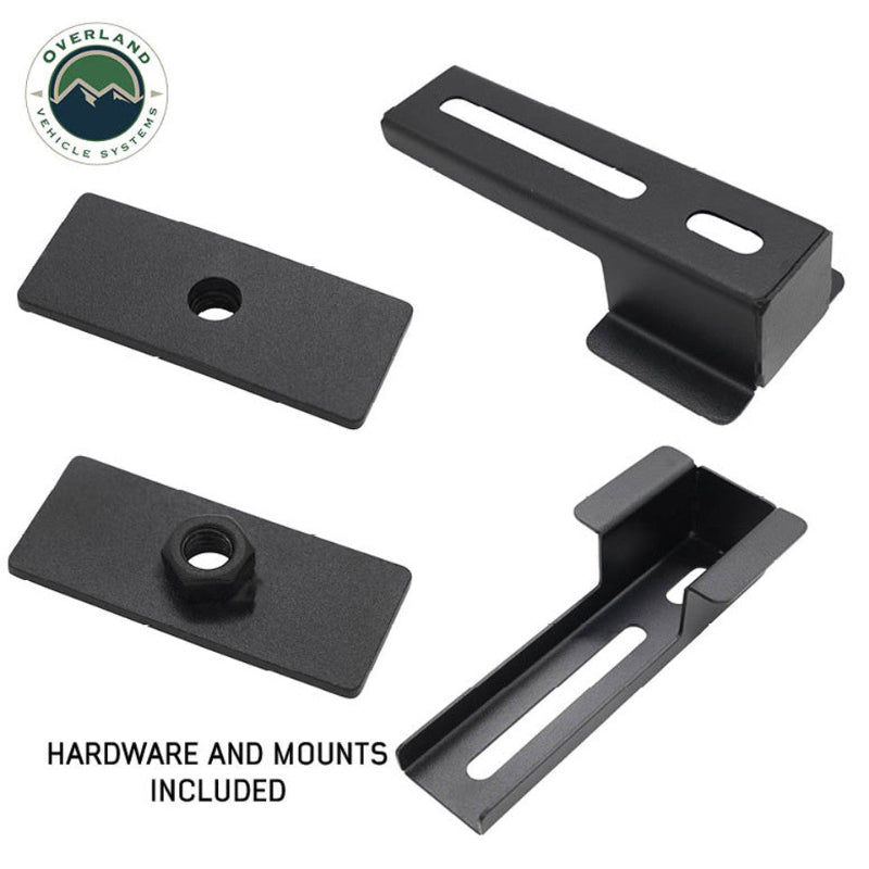 Image of the included black mounting hardware and brackets for the MOLLE panel system. The image shows two bracket mounts and two sliding plates with threaded inserts, all displayed at a slight angle on a white background
