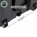 Image of large hard-shell storage dry box bottom detail showing leak-proof drain plug and dual wheels for easy mobility, dark gray rugged plastic construction in close-up angled view on white background.