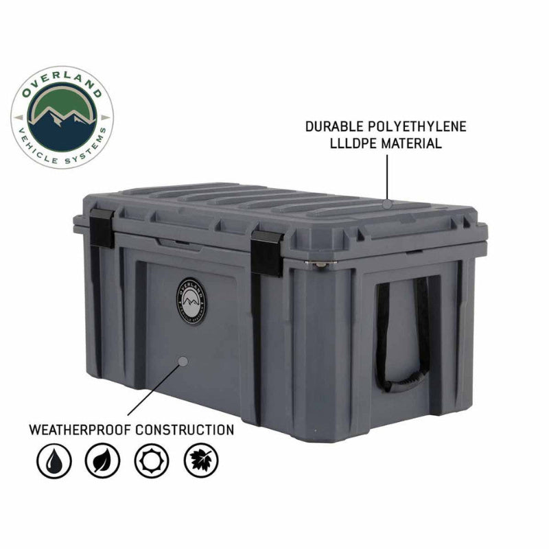 Image of large rugged hard-shell storage dry box made from durable polyethylene with weatherproof construction, dark gray plastic case shown in angled front and side view on white background.