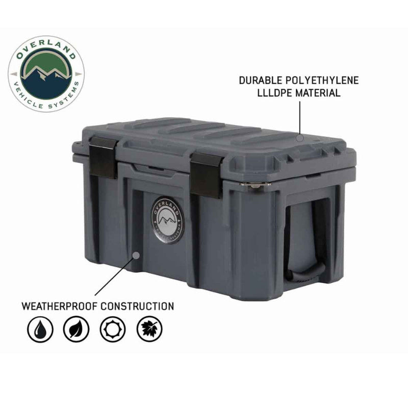Image of weatherproof hard-shell storage dry box made from durable polyethylene, dark gray rugged construction with locking lid and side handles shown in angled front and side view on white background.