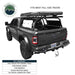 Image of Overland Vehicle Systems roof rack mounted on a full-size truck with a large storage box, showing the truck's rear and side view, with a text overlay stating "Fits most full-size trucks" and compatibility details