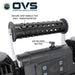 Image of OVS portable digital air compressor showing perforated grip handle and air release button, close-up angled top view on white background.