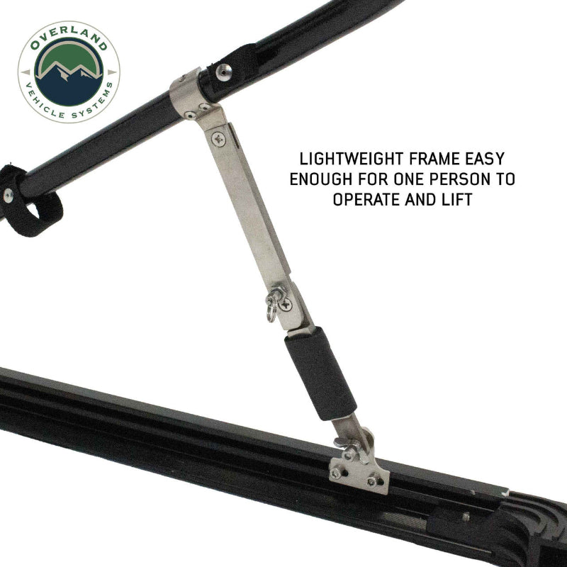 Image of the lightweight aluminum frame of the Explorer Soft Shell bed topper, with a close-up showing the hinge and gas strut components. The frame is designed for easy one-person operation and lifting