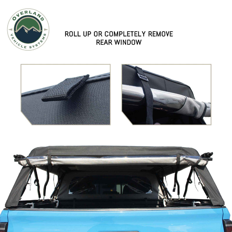 Image of a black soft shell camper top on a blue pickup truck, showing the rear window rolled up on a white background. Close-up photos show the buckle and strap used for rolling up the window