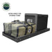 Image of an OVS black steel refrigerator slide holding a portable refrigerator and two green storage bags, with text "EXTRA SPACE FOR STORING ITEMS" pointing to the bags, all on a white background. This setup demonstrates how the slide can efficiently organize and secure both refrigeration and additional gear for overlanding adventures