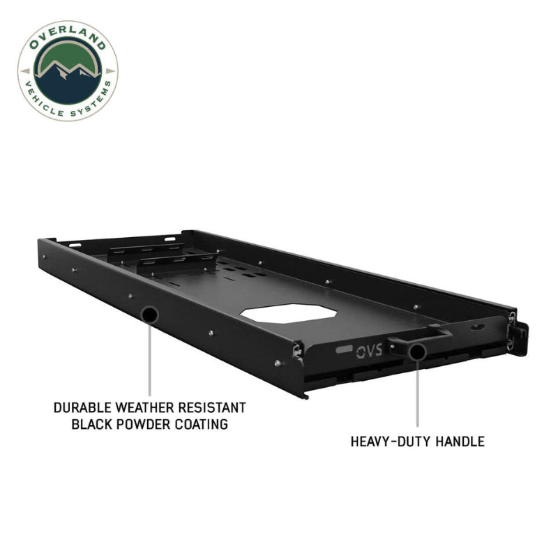 Image of an OVS black steel refrigerator slide from a front-facing, slightly elevated view, with features like the durable weather resistant black powder coating and heavy-duty handle labeled. This image highlights the rugged construction and key features of the slide