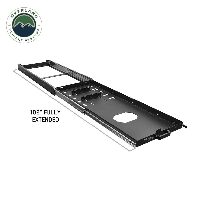 Image of an OVS black steel refrigerator slide from a front-facing, slightly elevated view, with a line and text showing the 102" fully extended length. This highlights the extensive reach of the slide, demonstrating its full functionality and ease of access