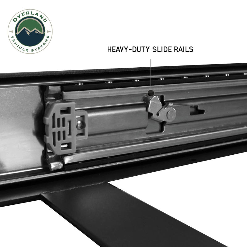 Image of the heavy-duty slide rails of an OVS refrigerator slide, shown in a detailed close-up view with the text "HEAVY-DUTY SLIDE RAILS". This close-up highlights the robust construction and quality of the components, ensuring smooth and reliable operation