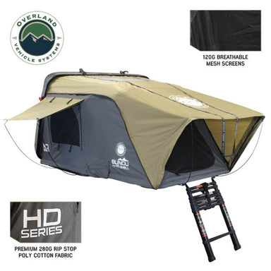 Image of Bundu Hard Shell Roof Top Tent fully deployed with khaki and grey HD Series fabric, telescoping ladder, 120G breathable mesh screens, and Overland Vehicle Systems branding, angled front and side view on white background
