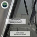 An image showing a close-up of the Bushveld Hard Shell Roof Top Tent's interior, highlighting "2 NITROGEN GAS CHARGED STRUTS FOR ENHANCED CONTROL" and "HEAT SEALED WATERPROOF SEAMS" on the grey fabric