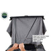 Image of Mamba 3 Clam Shell Roof Top Tent showing a heavy-duty nylon strap with grab handles for easy closing, with hands pulling the strap, close-up view on a white background