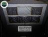 Image of Mamba Clam Shell Roof Top Tent interior showing 6 overhead removable Velcro storage pockets, close-up view of the fabric and pockets on a dark background