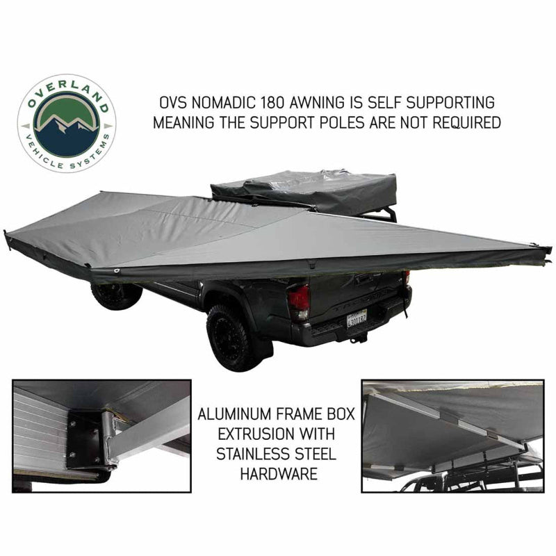 Image of an Overland Vehicle Systems' OVS Nomadic 180 Awning fully deployed on a gray truck. The image highlights that the awning is self-supporting, with a close-up showing the aluminum frame box extrusion and stainless steel hardware