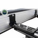 Image of the OVS Nomadic Awning showing a close-up of a single heavy-duty mounting bracket securing the awning to a vehicle's roof rack