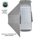 Image of the OVS Nomadic 180 Awning fully deployed from a vehicle, seen from a high angle to show the 88 square feet of coverage and the light grey 280G poly cotton ripstop canvas material