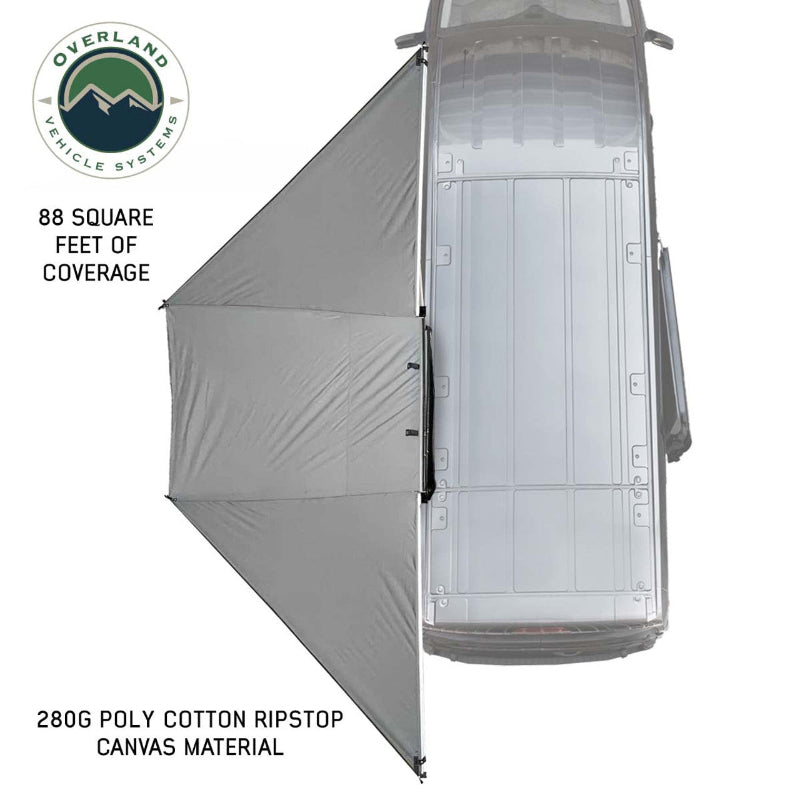 Image of the OVS Nomadic 180 Awning fully deployed from a vehicle, seen from a high angle to show the 88 square feet of coverage and the light grey 280G poly cotton ripstop canvas material