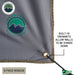Image of OVS HD Nomadic 180 awning connector kit 6-piece version fabric close-up showing built-in grommet and stake-down point on light gray ripstop material, detailed view on a white background.