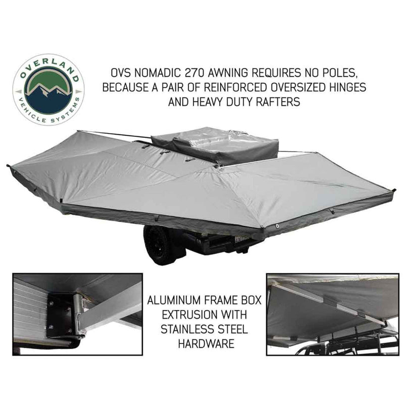 Image of an Overland Vehicle Systems Nomadic 270 awning, fully deployed from a trailer, showing the grey fabric and supported by its reinforced oversized hinges and heavy-duty rafters. Close-up insets show the aluminum frame box extrusion with stainless steel hardware