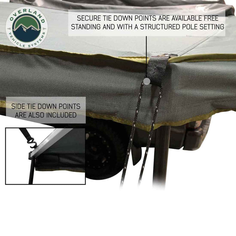 Image of a close-up of a secure tie-down point on a grey Overland Vehicle Systems 270-degree awning, showing how it's used with a structured pole and a cord. An inset highlights a separate side tie-down point