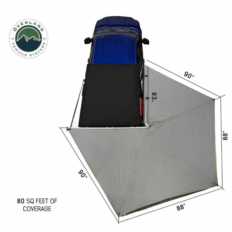 Image of a blue pickup truck with a Peregrine Awning partially deployed. The grey awning is extended from the side and rear of the vehicle, showing its dimensions and the 80 square feet of coverage, viewed from directly above on a white background