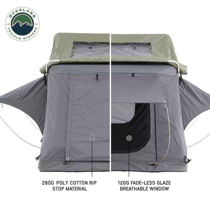 Image of a Nomadic 2 Standard roof top tent on a white background, split down the middle to show the tent's features. The left side highlights the 280G poly cotton rip stop material, while the right side shows the 120G fade-less glaze breathable window.