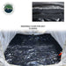 Image of the interior of a vehicle awning room enclosure highlighting a removable black waterproof floor with zipper detail for easy cleaning, shown from above on a white background.